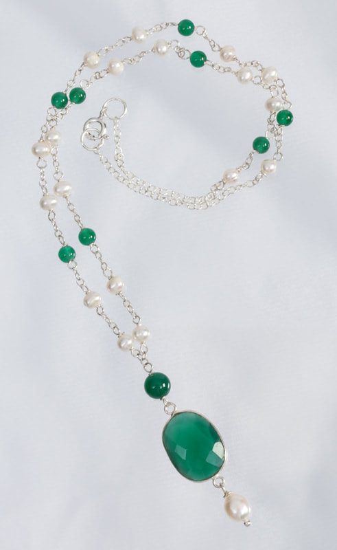 Jewelry Photography silver, pearl and precious stone necklace