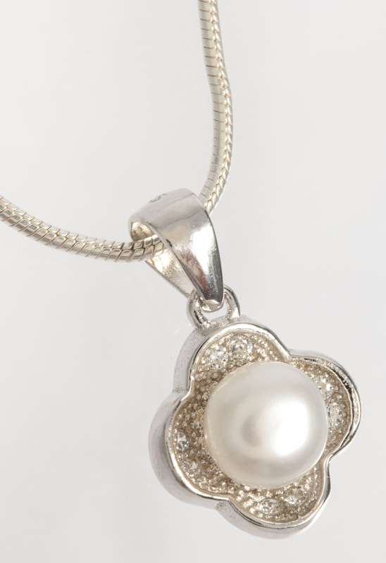 Jewelry Photography Pearl and silver necklace